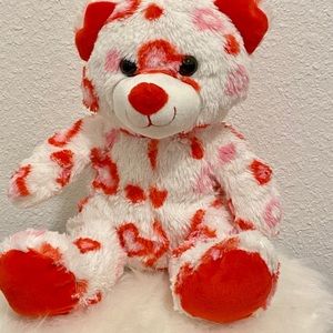 HUG&LUV Bear plushy, 10 1/2 “ H x 5 1/2” W, white with red and pink hearts.
